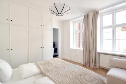 Rare 4BR Apartment w Unique Details in CPH City - image 7